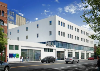 A rendering of a white building with cars on the street.